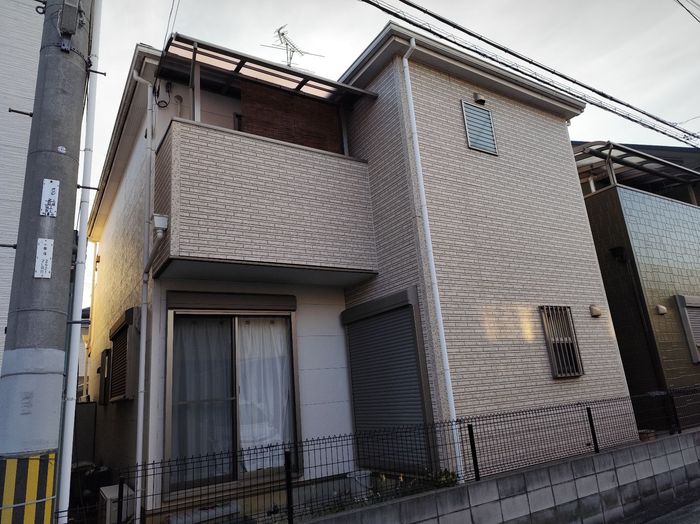 八尾市曙川東 築25年 窯業系サイディング外壁 施工前の背面 チョーキング劣化