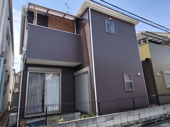 八尾市曙川東 築25年 窯業系サイディング外壁 施工後の背面 ダークブラウン